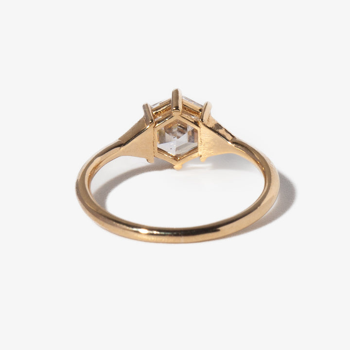 Detailed view of hexagon cut lab diamond art deco engagement ring showing symmetry and refined geometric facets