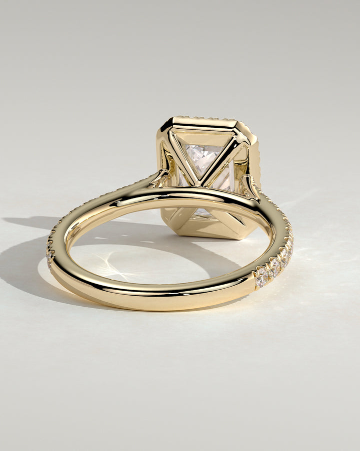 Gold pave solitaire ring