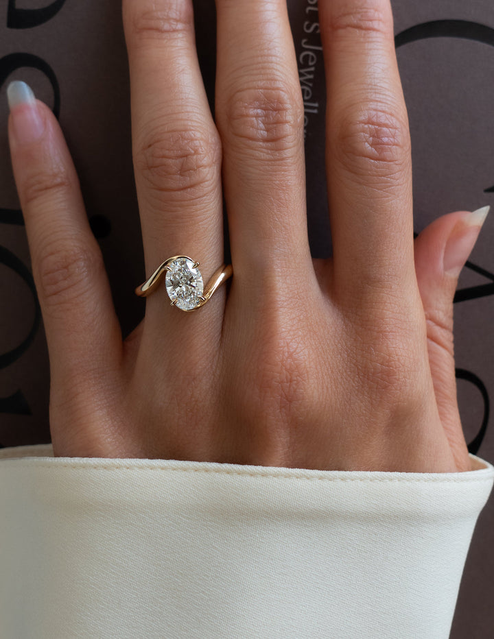 Oval Cut Bypass Diamond Ring