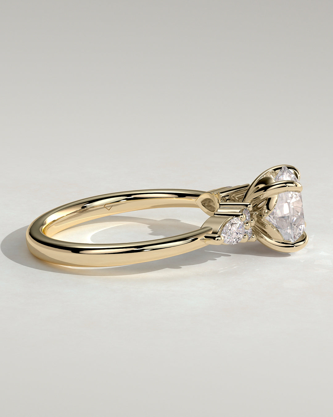 Lab grown round diamond engagement ring pear accents