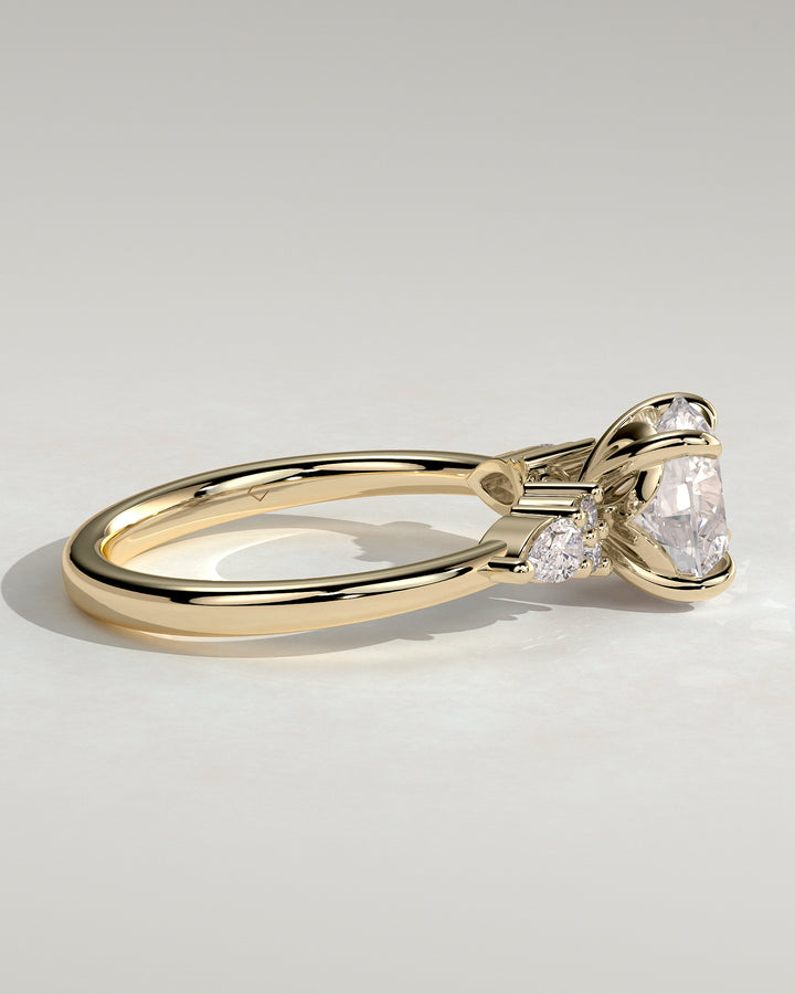 Lab grown round diamond engagement ring pear accents