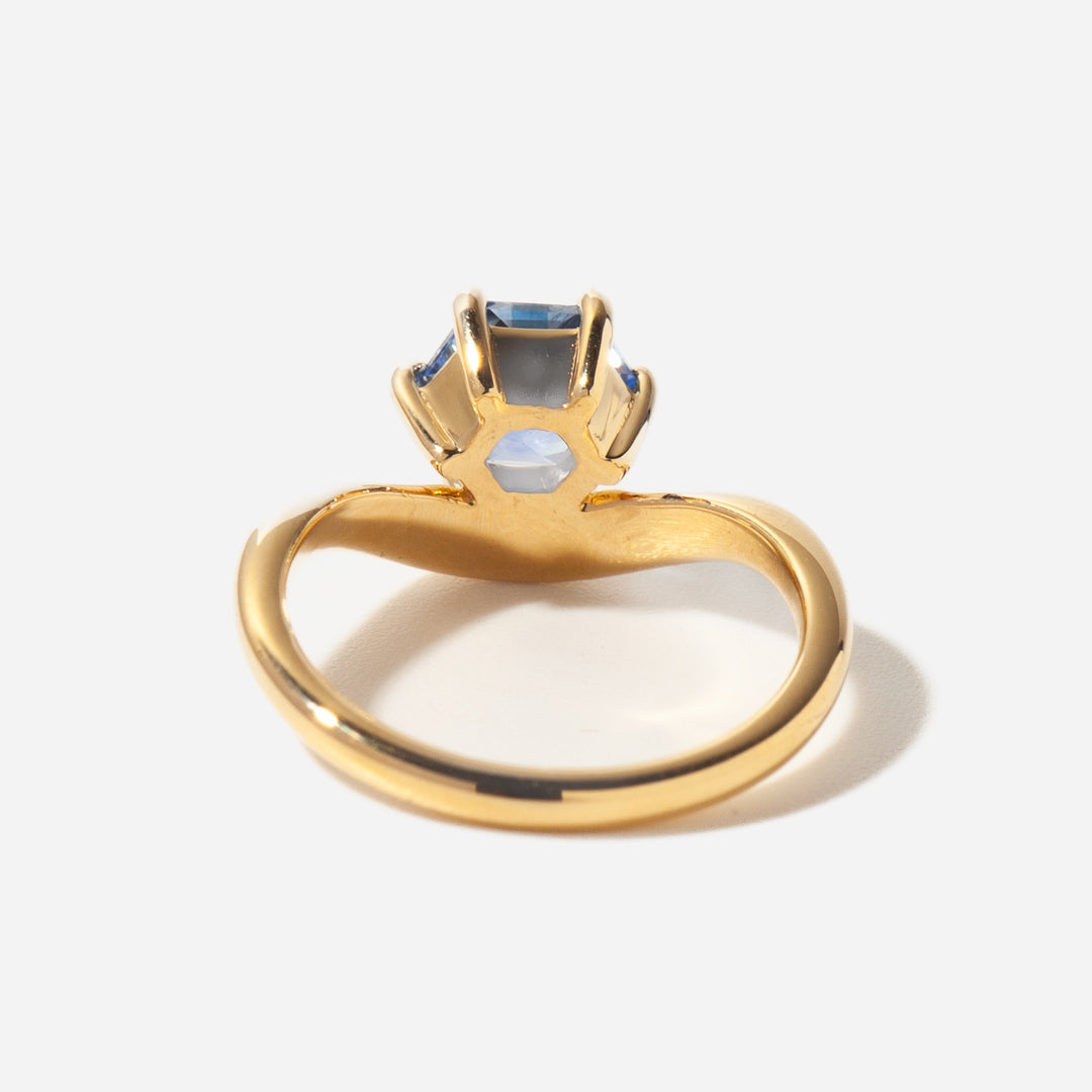 Luxury hexagon blue sapphire engagement ring with lab grown diamond curved design and refined craftsmanship