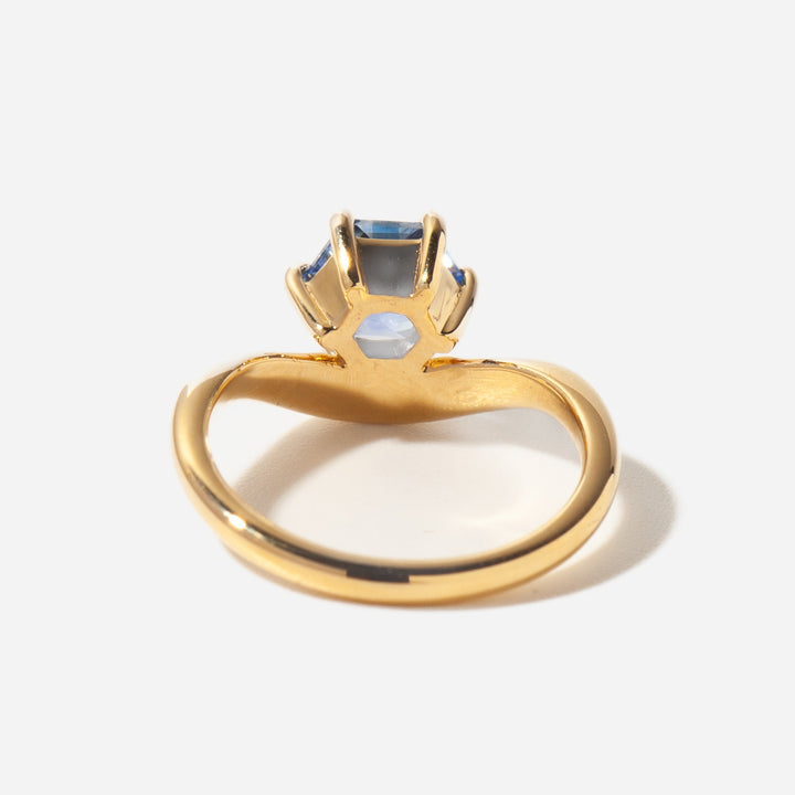 Luxury hexagon blue sapphire engagement ring with lab grown diamond curved design and refined craftsmanship