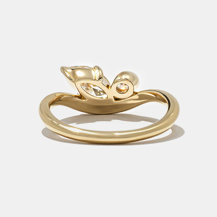 0.7 carat marquise and oval lab diamond Toi Et Moi engagement ring in polished gold bezel setting minimalist style