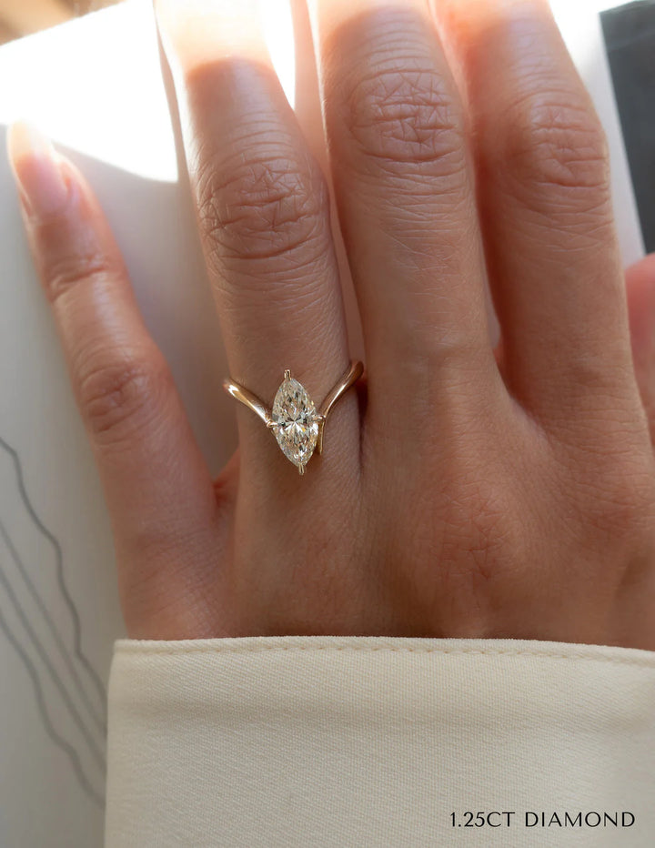 Luxury marquise cut diamond engagement ring with coordinating band