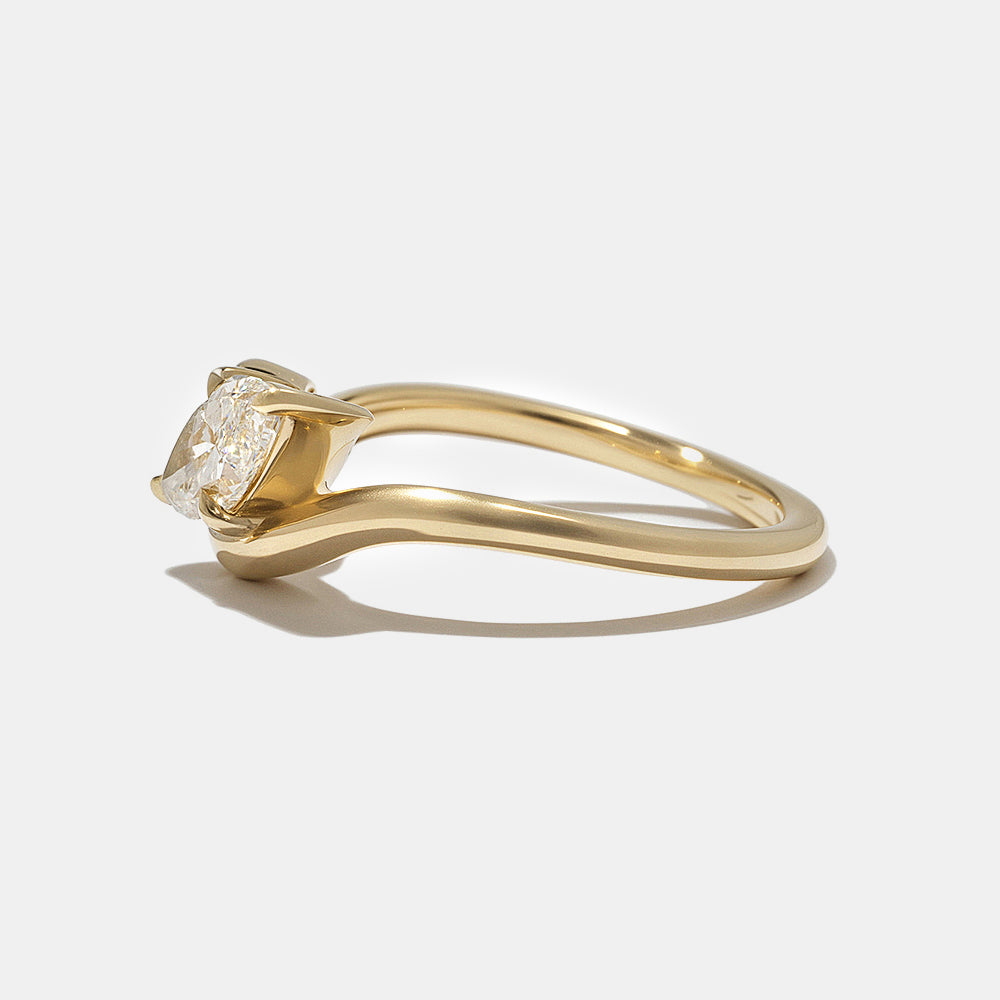 Modern Toi Et Moi engagement ring featuring marquise and oval lab grown diamonds in secure bezel setting