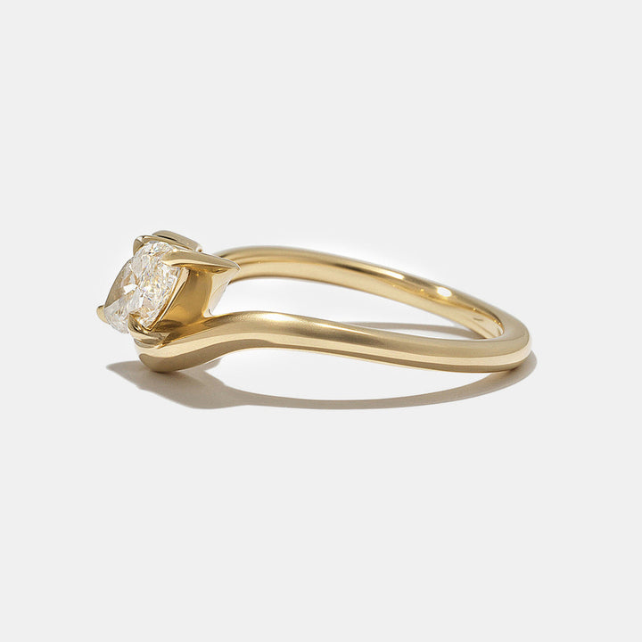 Modern Toi Et Moi engagement ring featuring marquise and oval lab grown diamonds in secure bezel setting