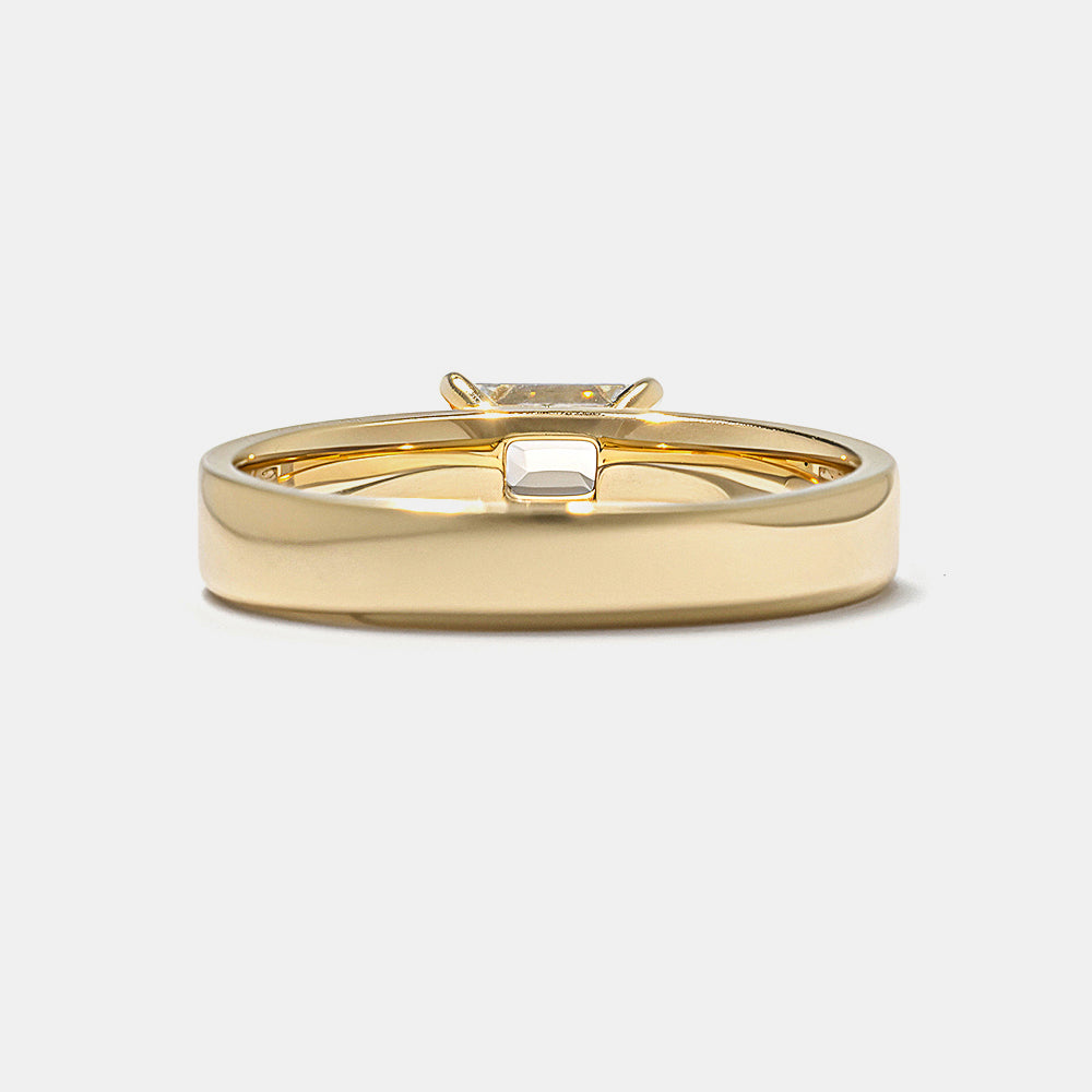 Modern east west emerald lab grown diamond cigar band solitaire engagement ring featuring sleek horizontal bold styling