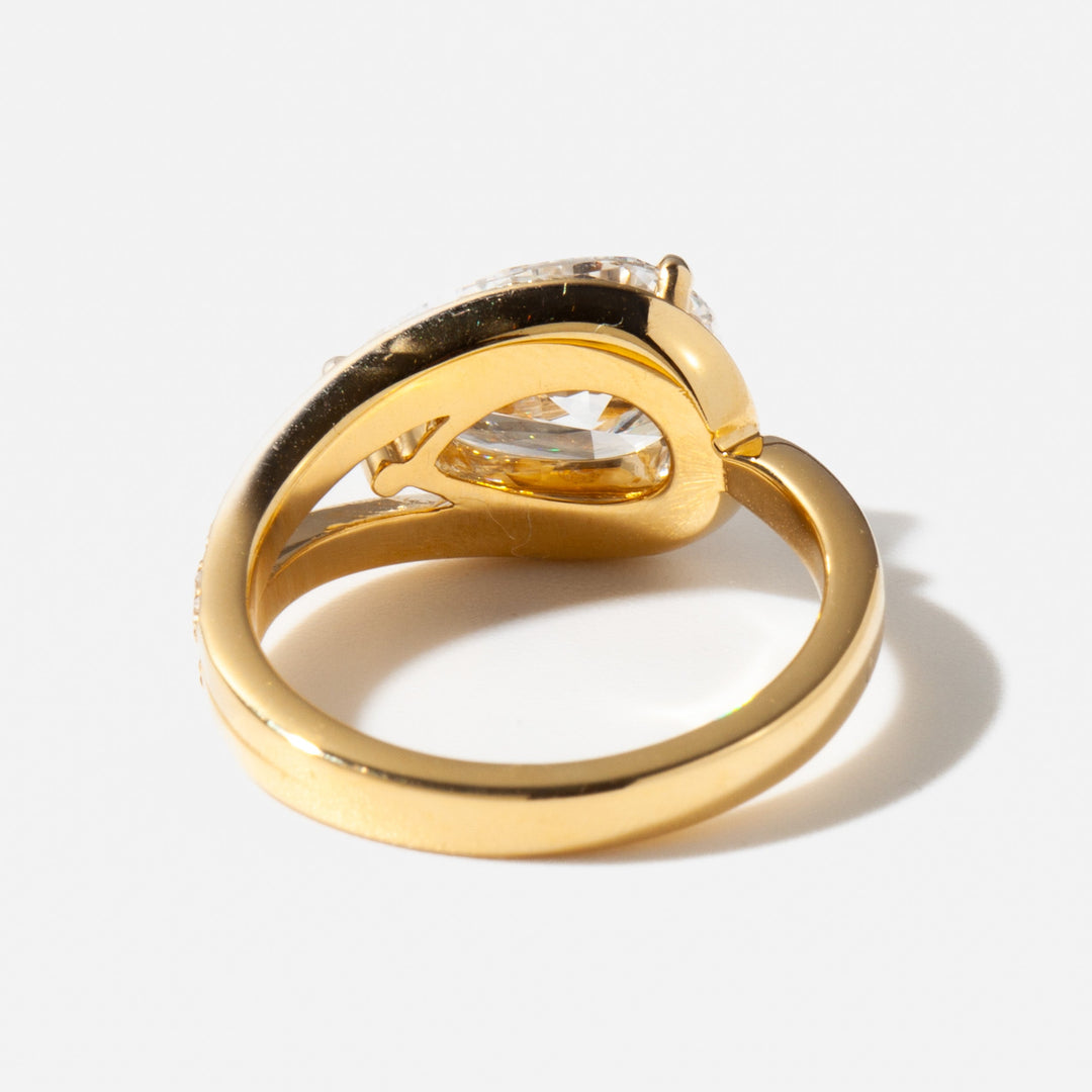 Modern east west pear cut lab grown diamond engagement ring designed for unique and contemporary bridal style