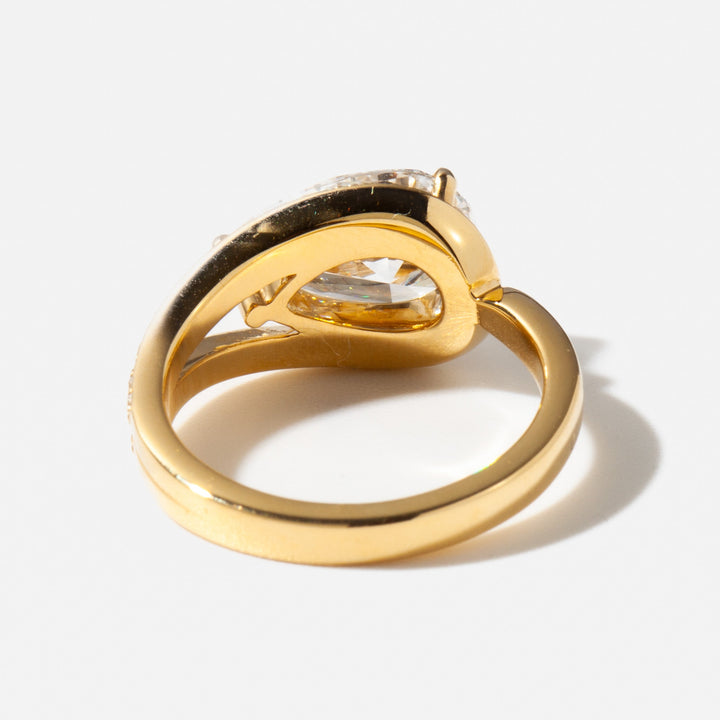 Modern east west pear cut lab grown diamond engagement ring designed for unique and contemporary bridal style