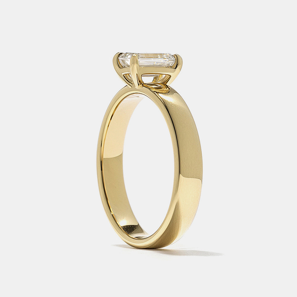 Modern emerald cut CVD lab grown diamond solitaire engagement ring featuring clean architectural minimal design