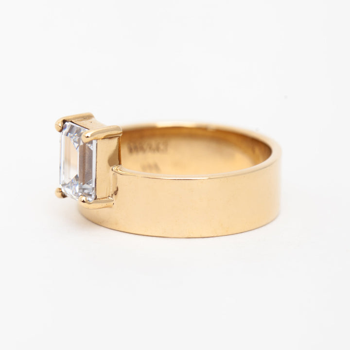 Modern emerald cut lab grown diamond monolith engagement ring featuring clean geometric architectural styling
