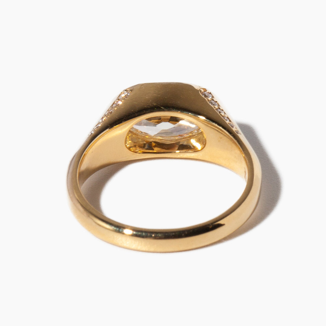 Modern moval cut lab grown diamond signet engagement ring featuring sleek elongated bold architectural styling
