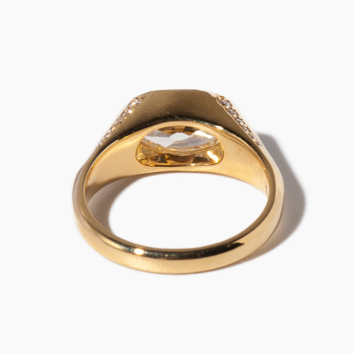 Modern moval cut lab grown diamond signet engagement ring featuring sleek elongated bold architectural styling