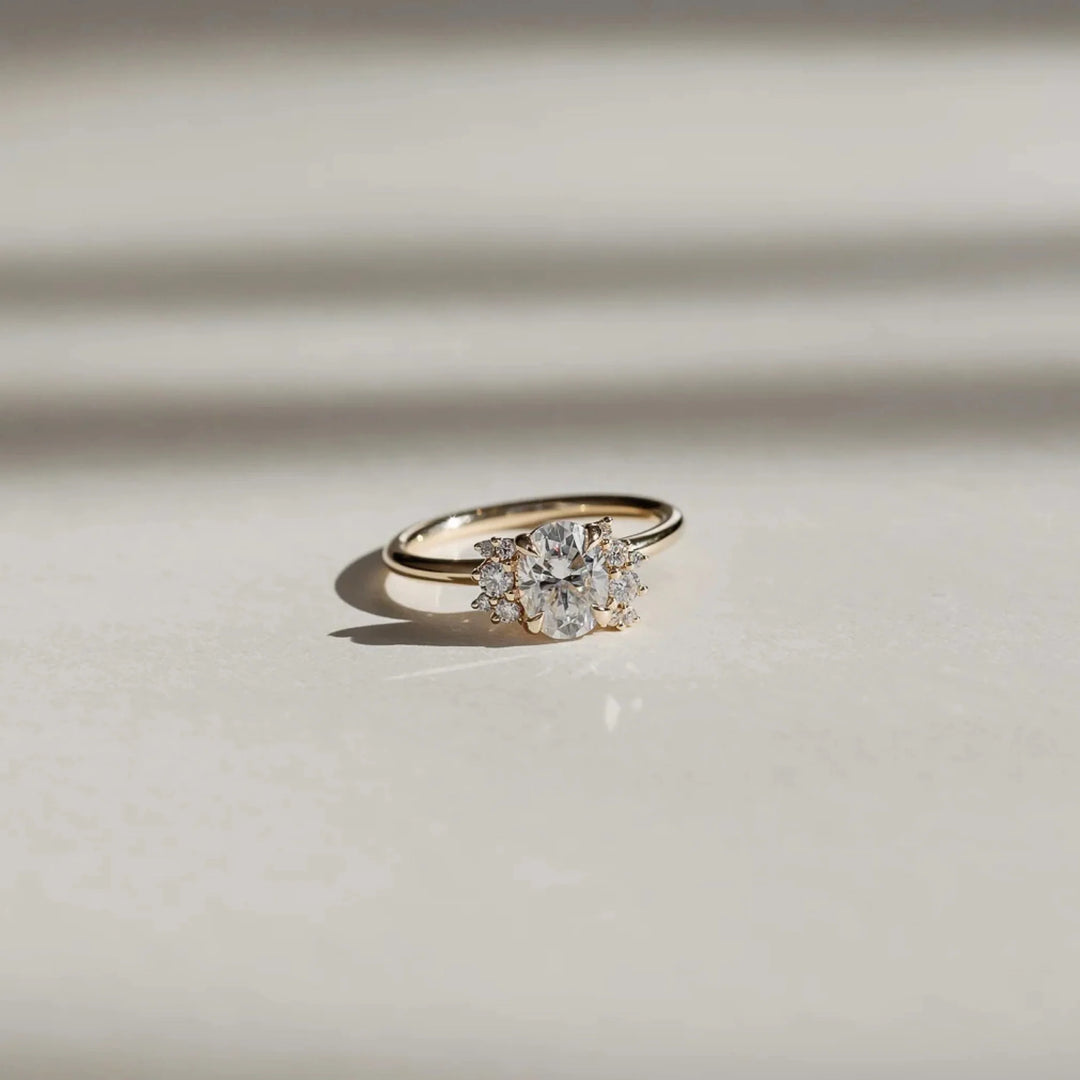 modern oval cut cluster engagement ring IGI certified lab grown diamond