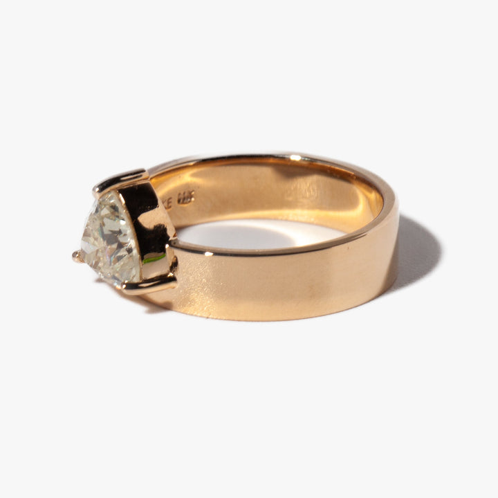 Modern trillion cut lab grown diamond monolith engagement ring featuring geometric architectural clean styling