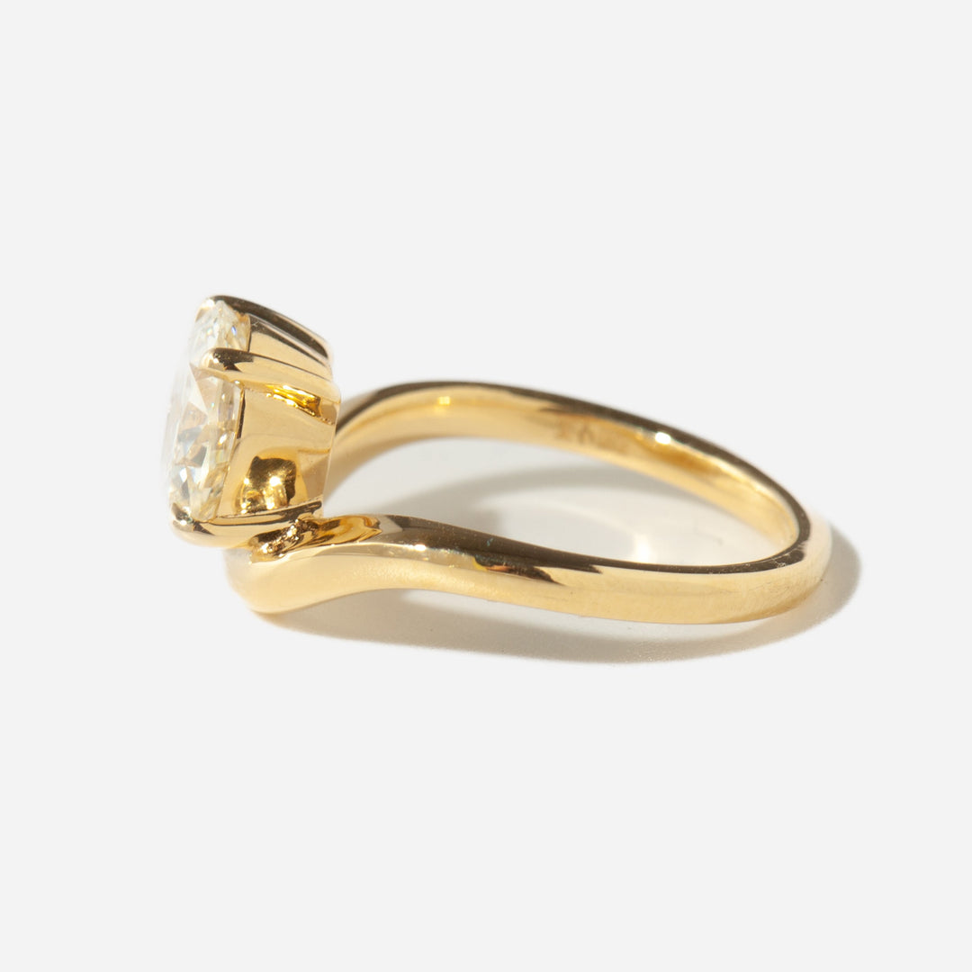 Detailed view of an old European cut lab grown diamond engagement ring with curved antique inspired setting