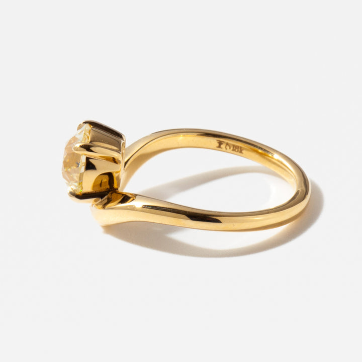 Side profile of a 1.5 carat old European cut lab diamond engagement ring showing antique curved band structure