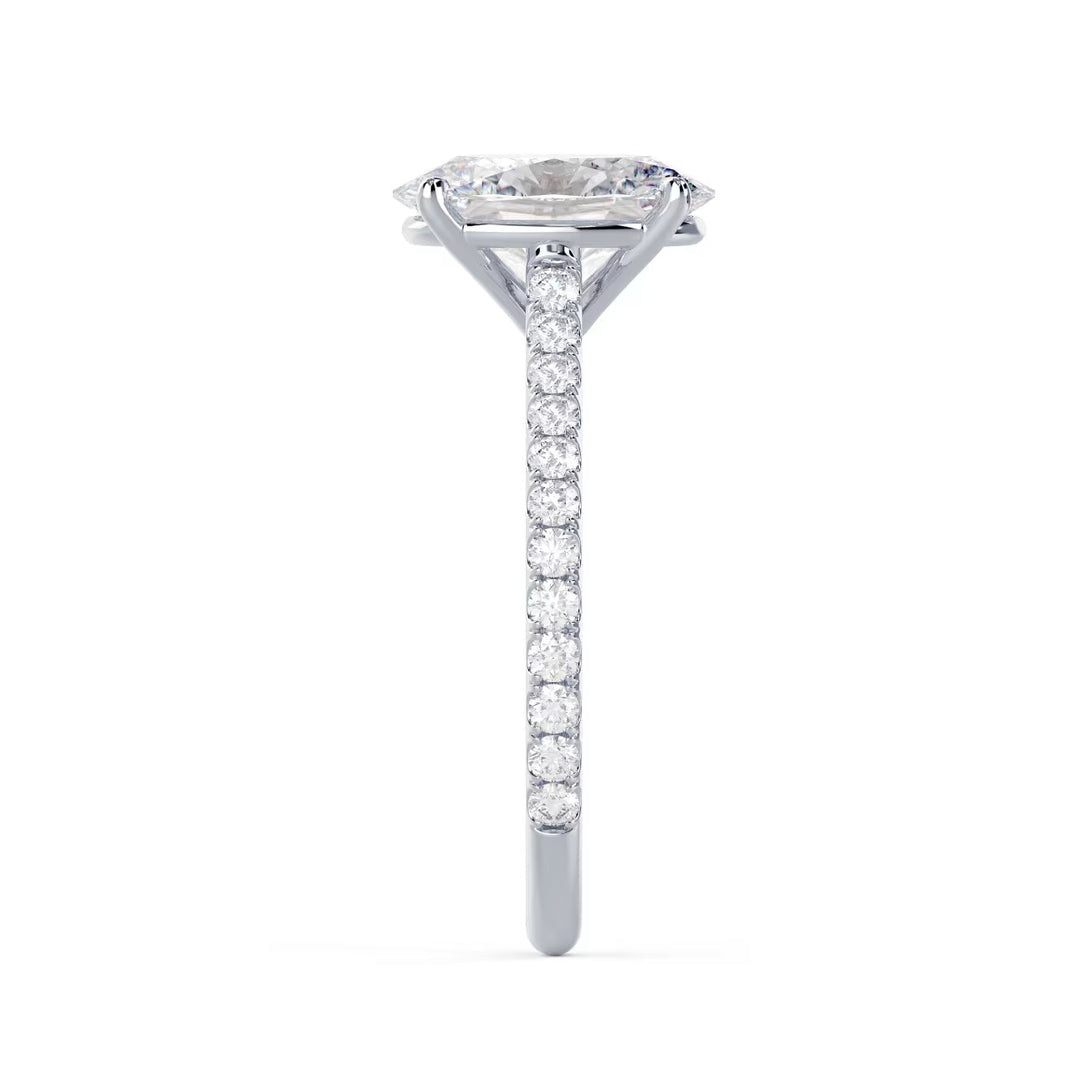 Side profile of an oval cut lab grown diamond cathedral pave engagement ring showing elevated cathedral setting design