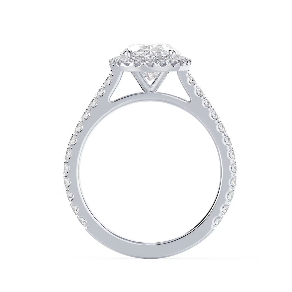 Close-up of an oval cut lab grown diamond halo cathedral pave engagement ring highlighting elongated brilliance and pavé detailing