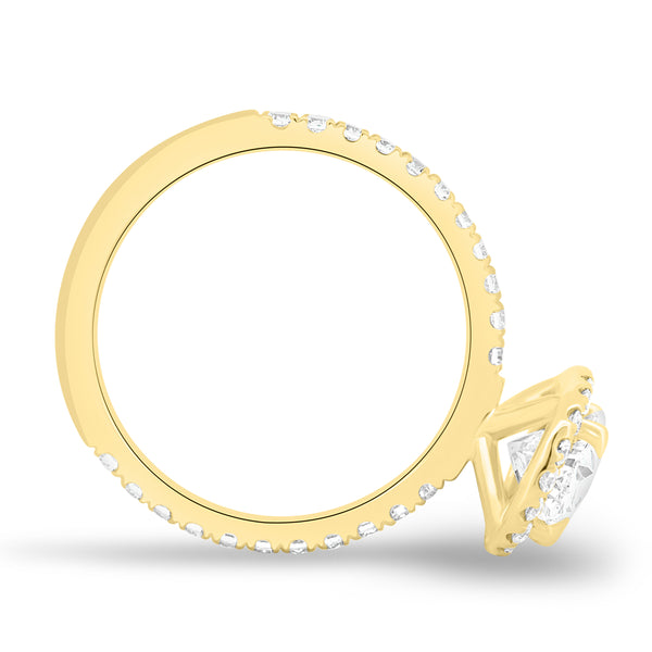 Oval cut lab diamond halo engagement ring featuring a pavé-set shank and brilliant surrounding halo diamonds