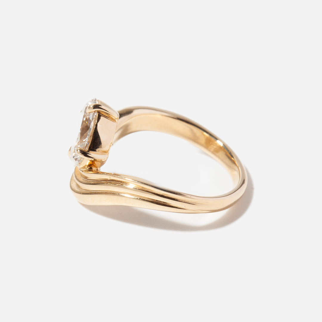 Side profile of an oval lab grown diamond engagement ring showing elegant curved classic band structure
