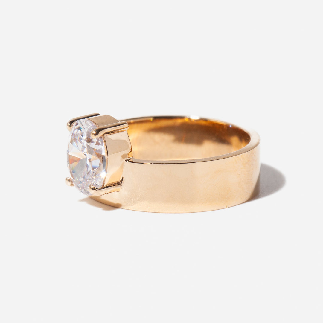 Side profile of oval cut lab grown diamond monolith engagement ring with sleek modern minimalist structure