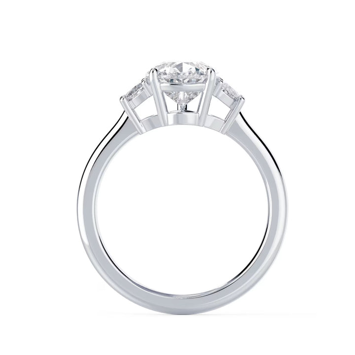 pear cut three stone solitaire engagement ring
