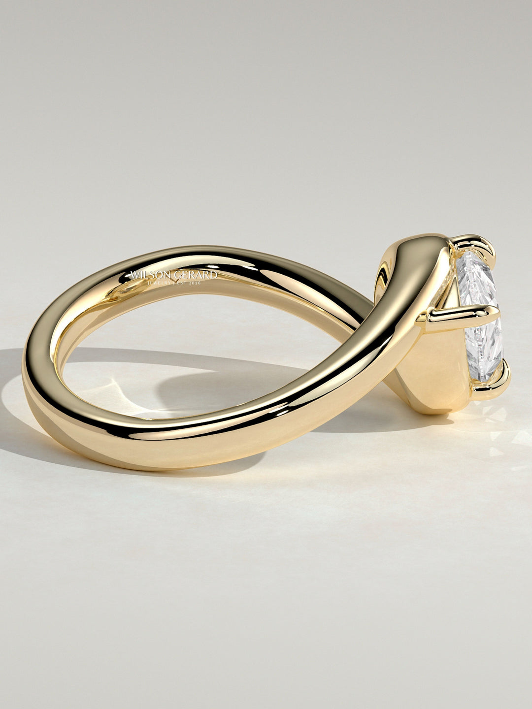 east west pear engagement ring