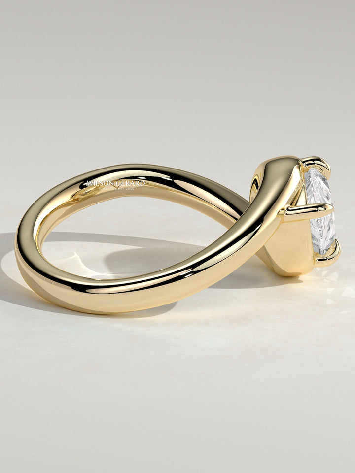 east west pear engagement ring
