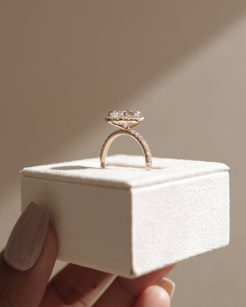 pear cut halo engagement ring with pavé band USA