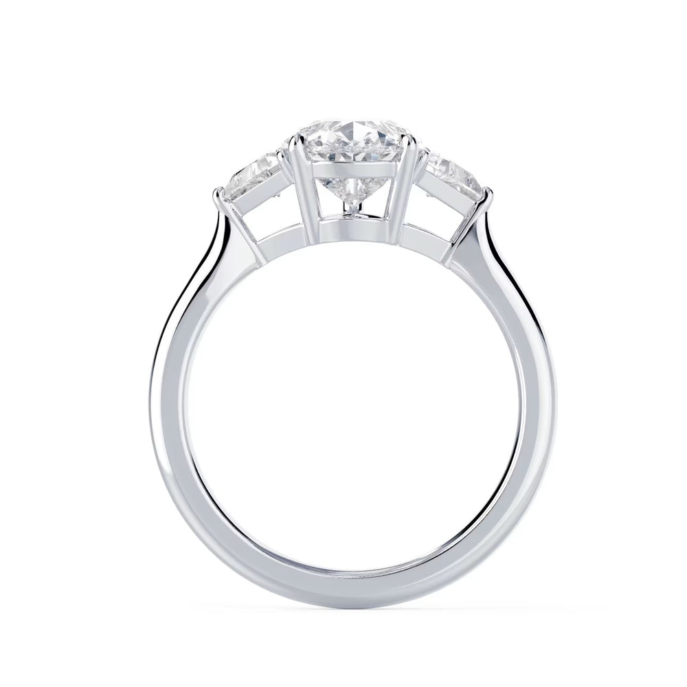 pear shaped three stone engagement ring