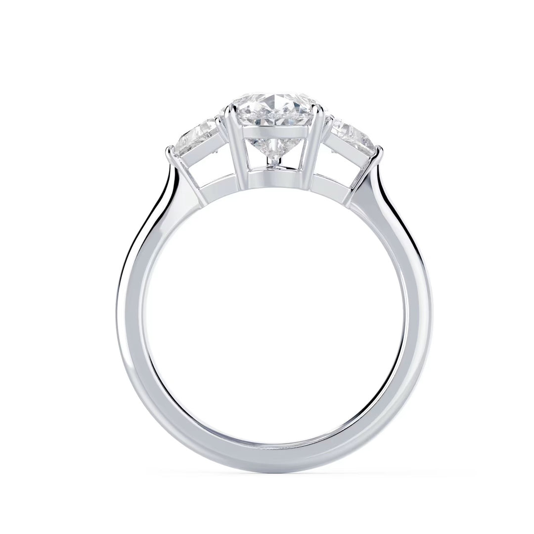 pear shaped three stone engagement ring