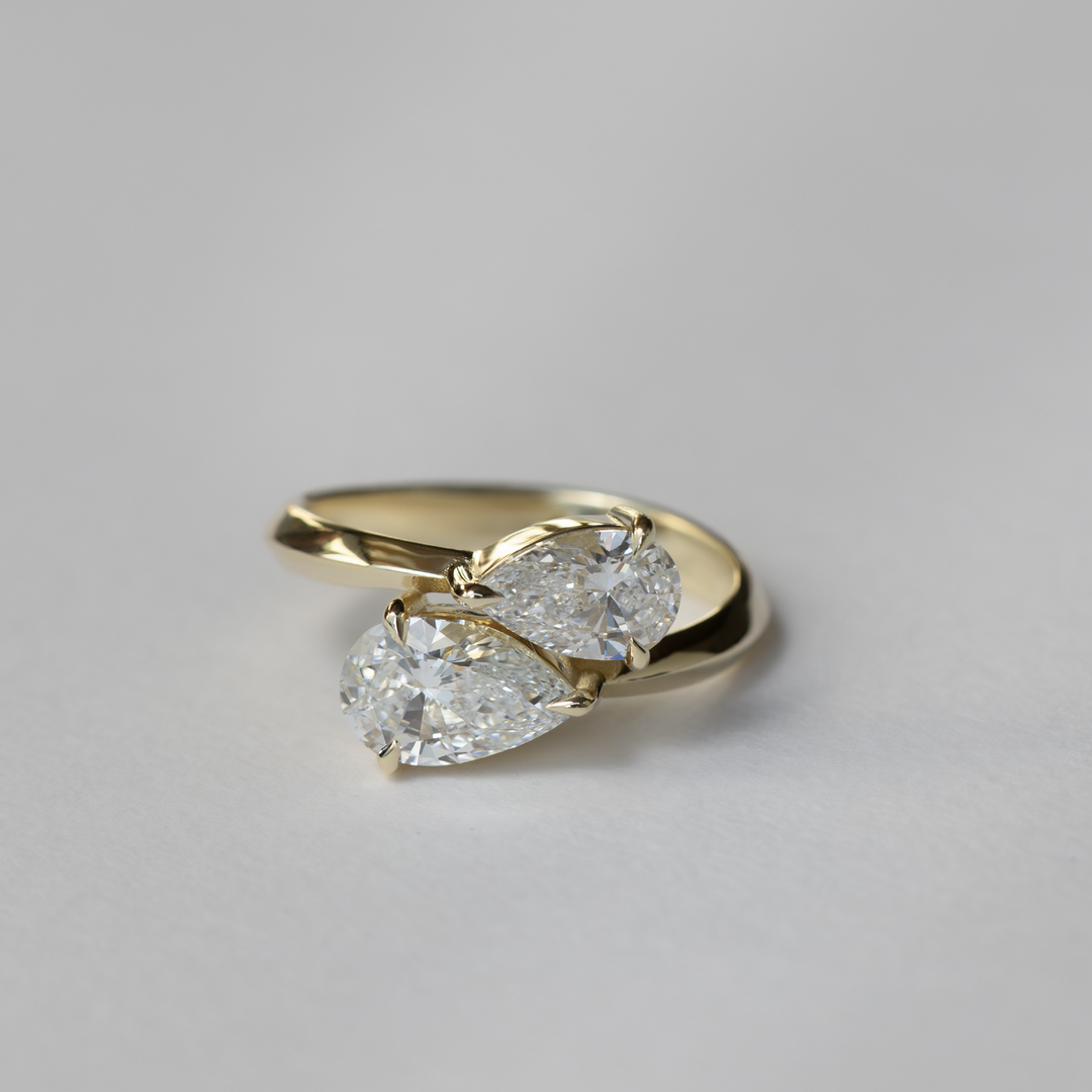 minimalist twisted knife edge toi et moi pear ring IGI USA 1ct