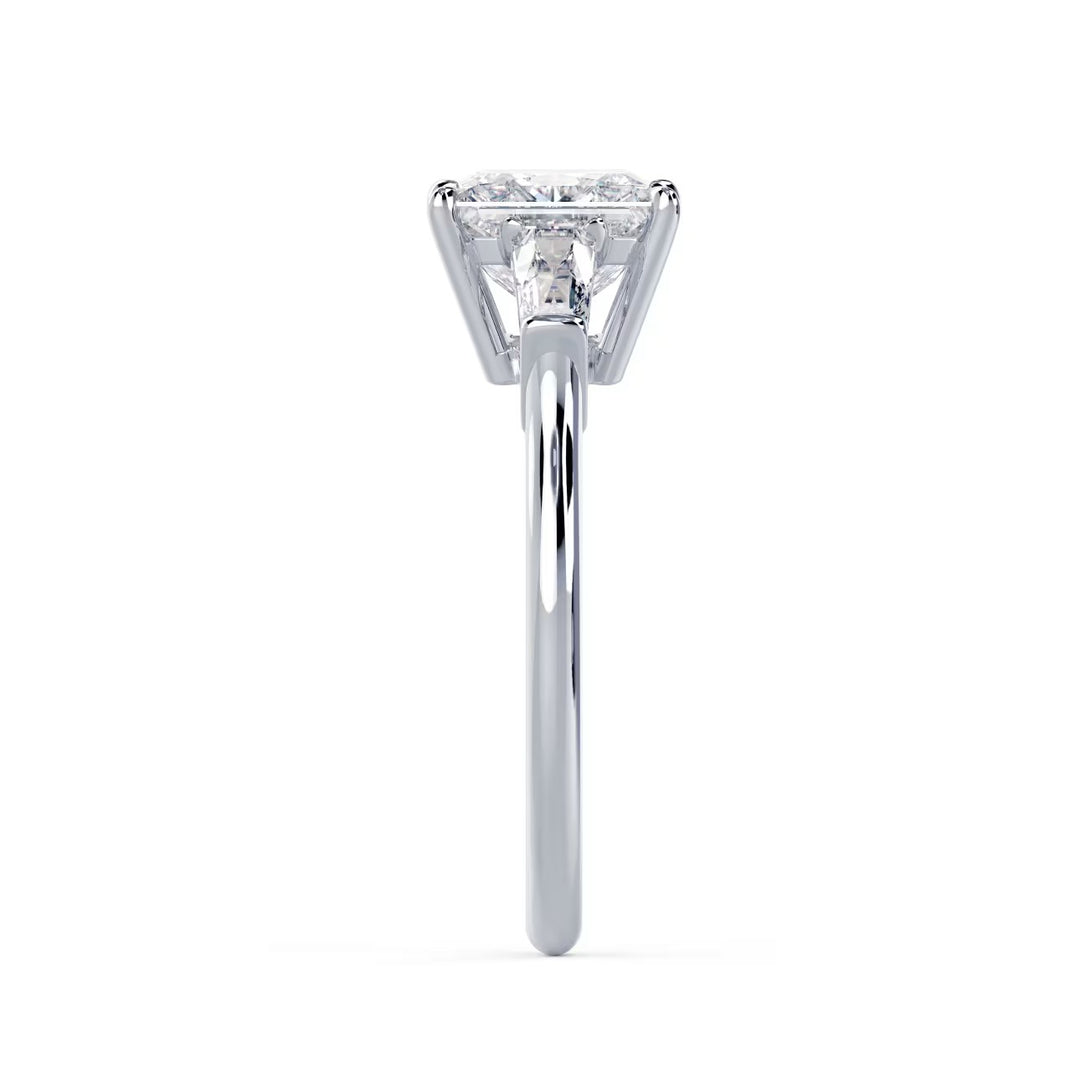 Side profile of princess cut lab grown diamond three stone engagement ring highlighting elegant prong setting