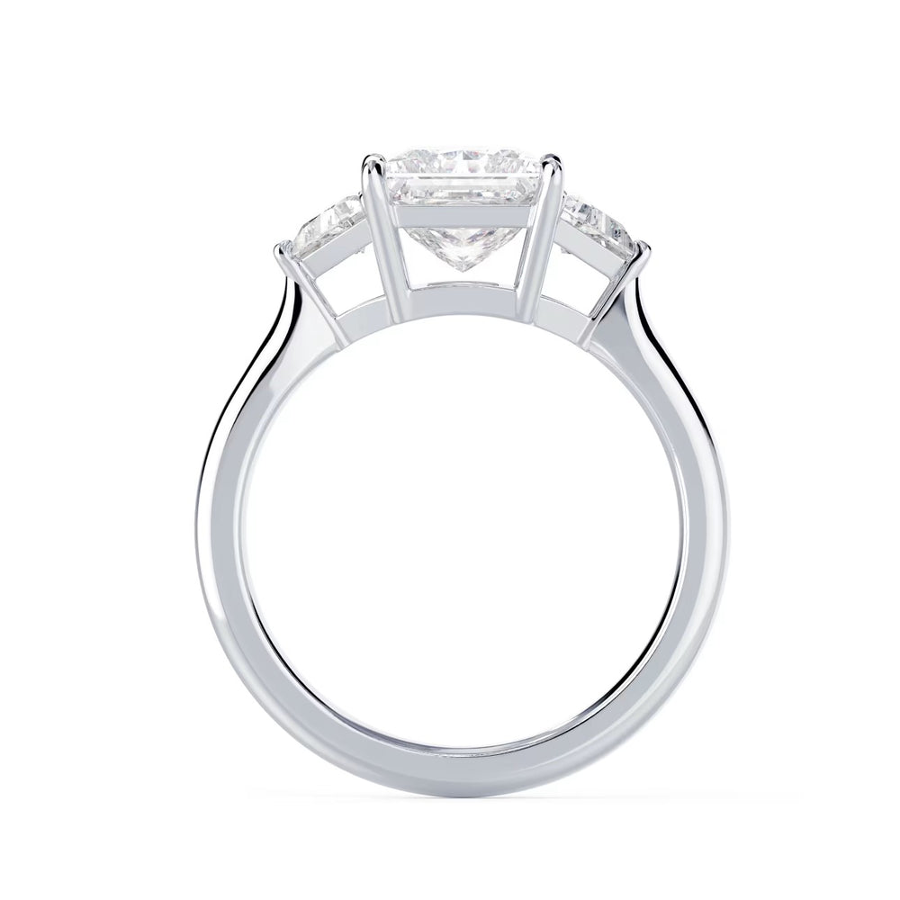 Side profile of princess cut lab grown diamond three stone engagement ring highlighting elegant prong setting and craftsmanship