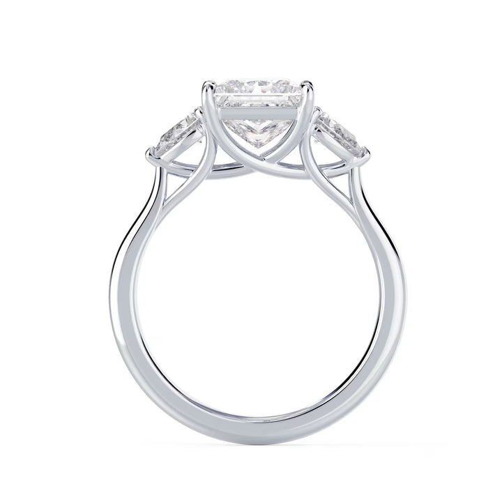 Side profile of princess cut lab grown diamond three stone engagement ring highlighting elegant prong setting and craftsmanship