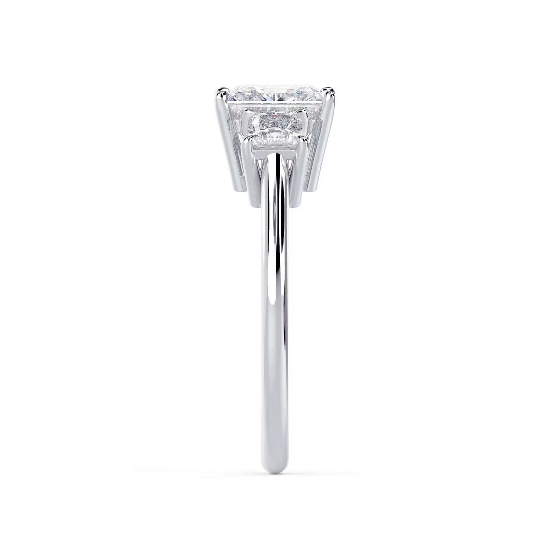 Side profile of princess cut lab grown diamond three stone solitaire engagement ring highlighting elegant prong setting