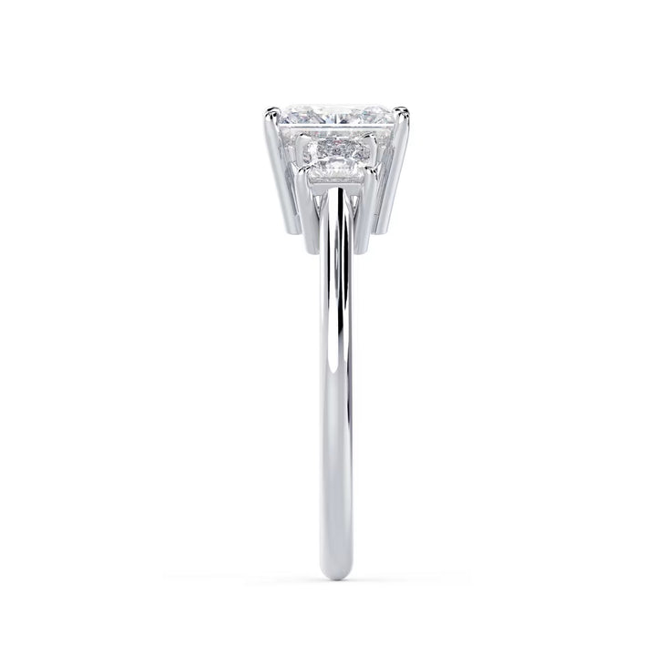 Side profile of princess cut lab grown diamond three stone solitaire engagement ring highlighting elegant prong setting