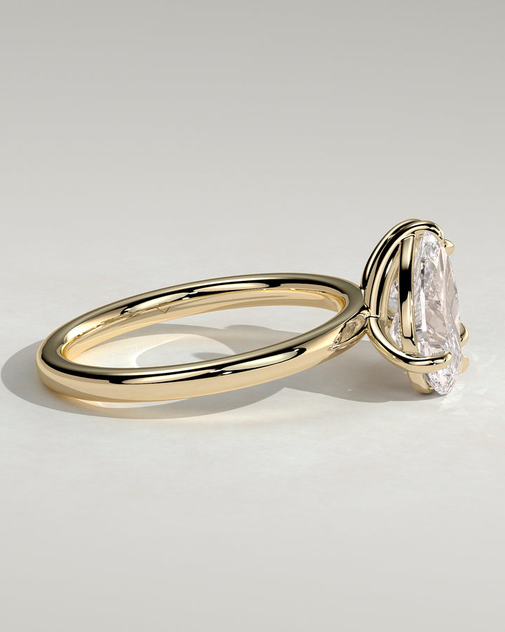 Princess cut and pear diamond ring
