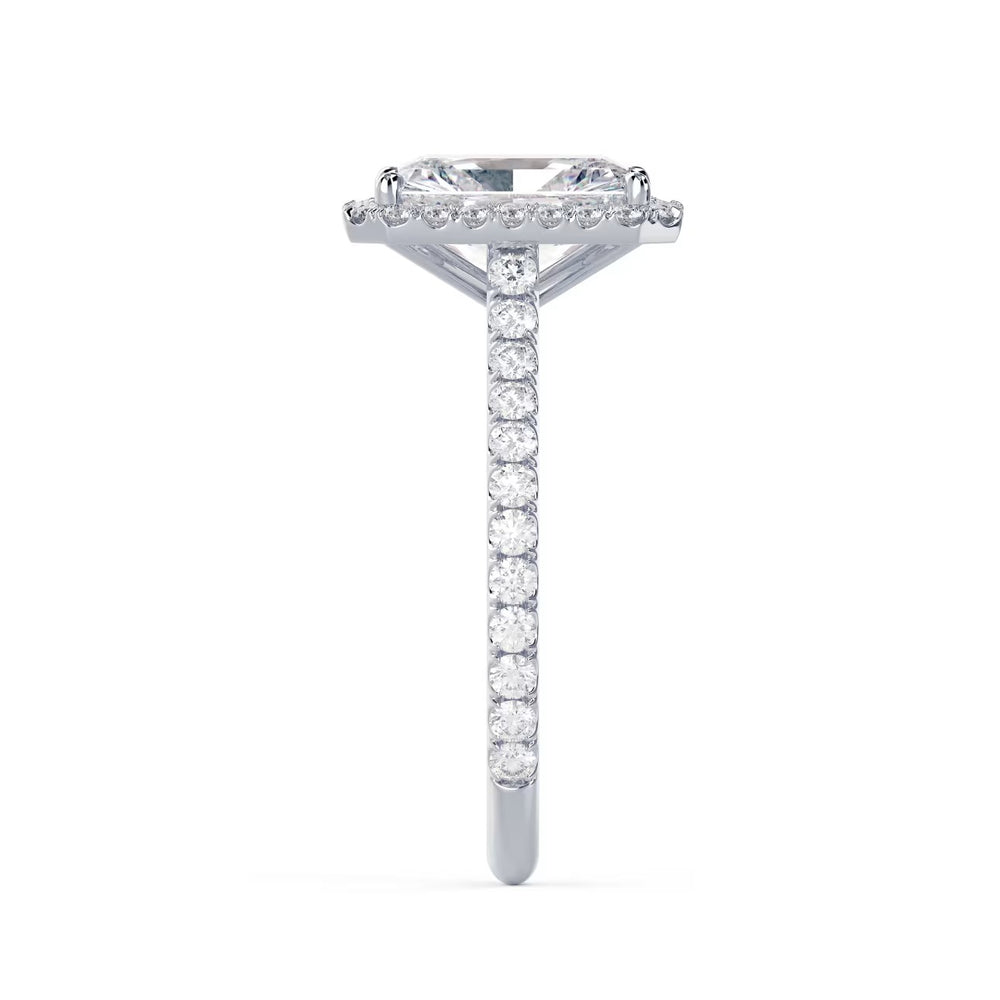 Side profile of a radiant cut lab grown diamond halo cathedral pave engagement ring showing raised cathedral setting