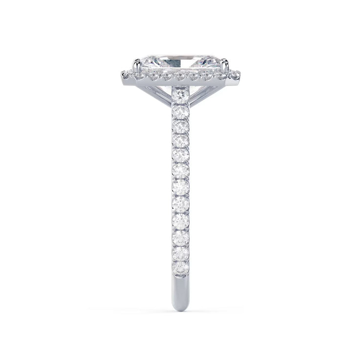 Side profile of a radiant cut lab grown diamond halo cathedral pave engagement ring showing raised cathedral setting