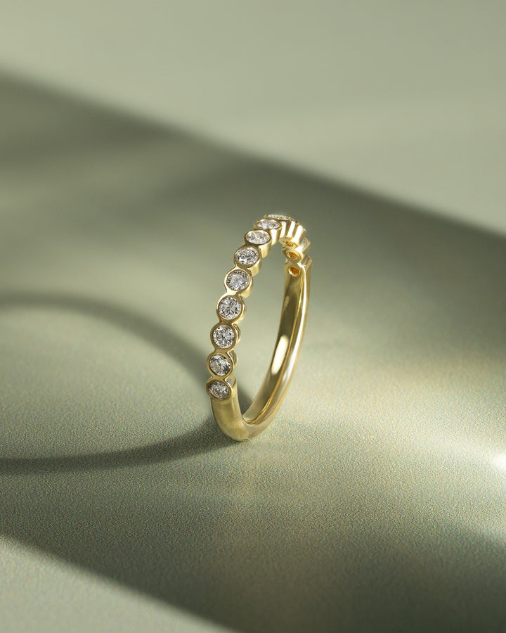 Round Bezel Set Half Eternity Wedding Band