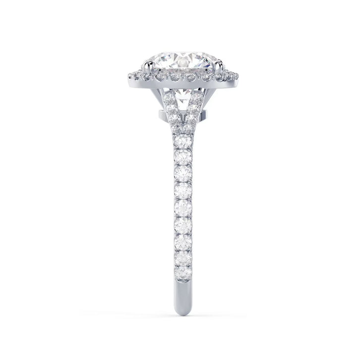 Close-up of a round cut lab grown diamond halo split shank engagement ring showcasing sparkle and halo detailing