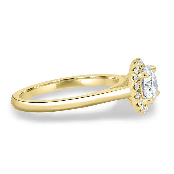 Side profile of round lab diamond halo solitaire engagement ring showing elevated center stone and refined structure