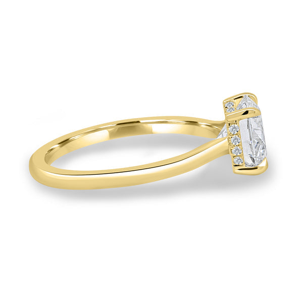 Side profile of round lab diamond hidden halo solitaire engagement ring highlighting the hidden halo beneath the center stone