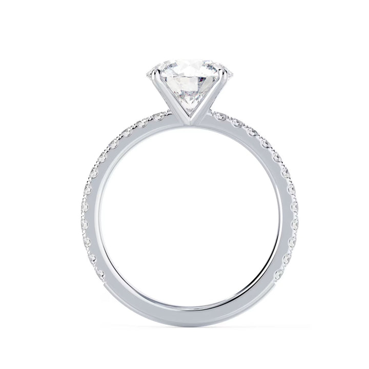 Close-up of a round cut lab grown diamond pave engagement ring highlighting brilliant sparkle and pavé band detailing