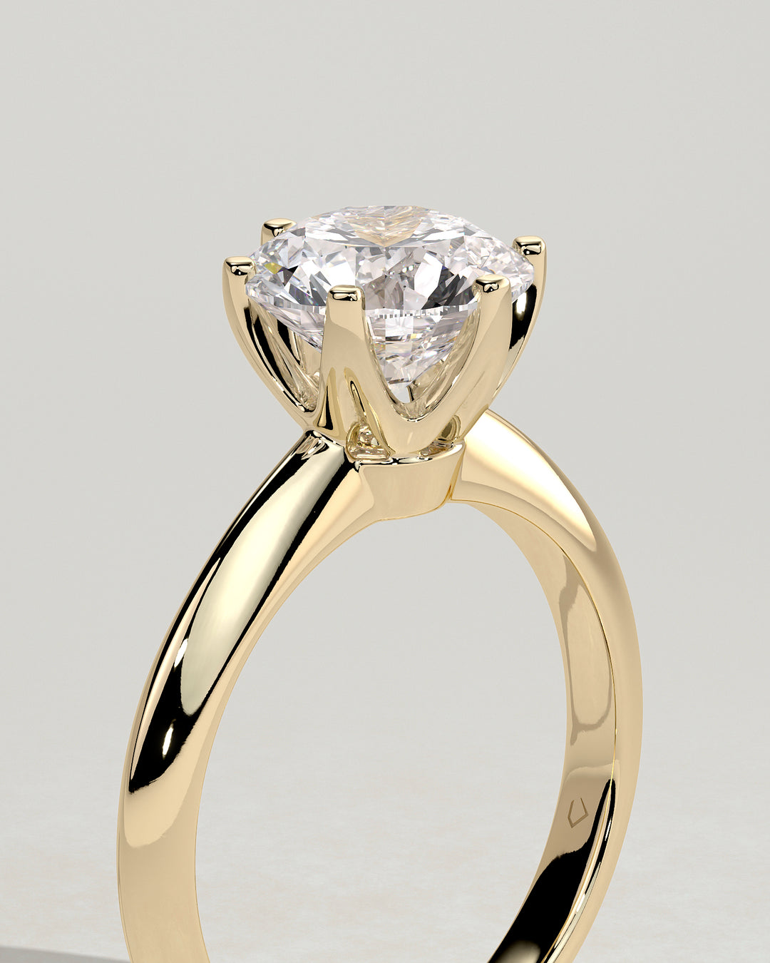 Round solitaire engagement ring