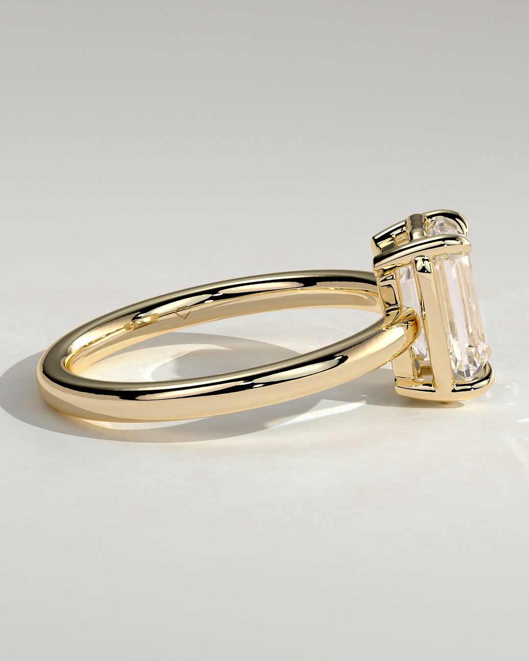 IGI certified emerald cut bezel solitaire engagement ring E VS2 diamond