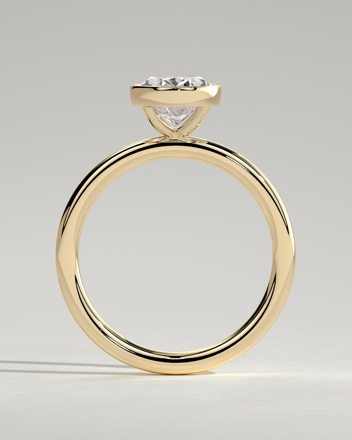 Solitaire engagement ring with bezel